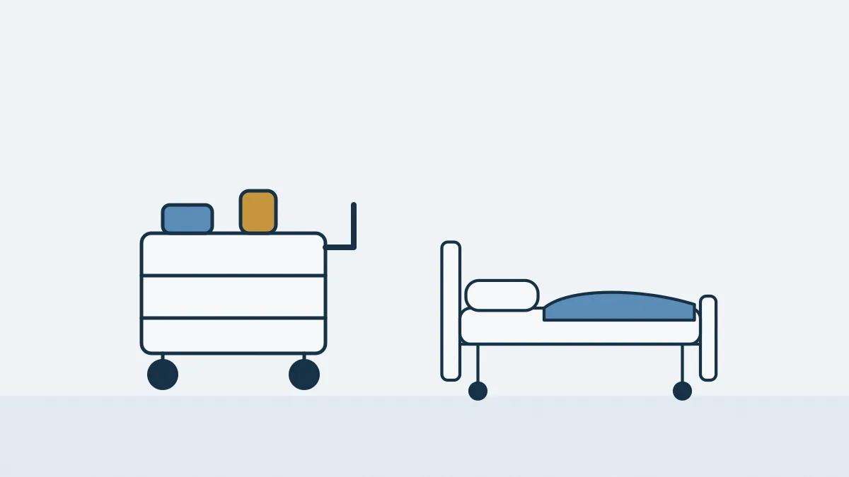 Un chariot de ménage et un lit de soin