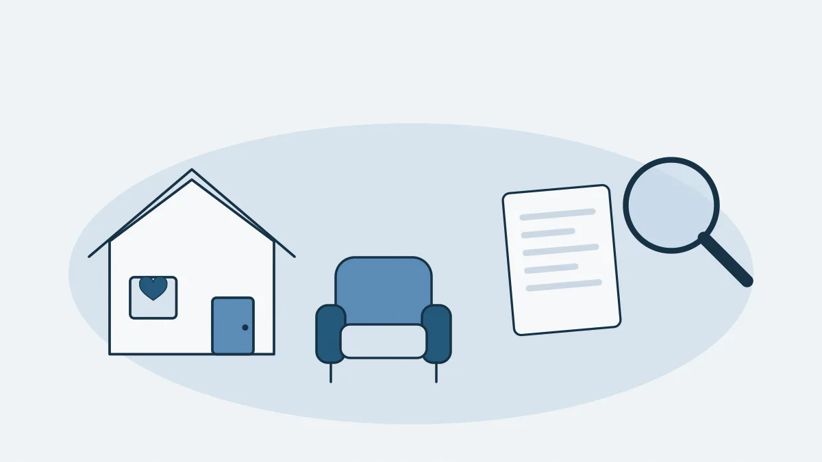 Une maison, un fauteuil et deux documents comparés à la loupe