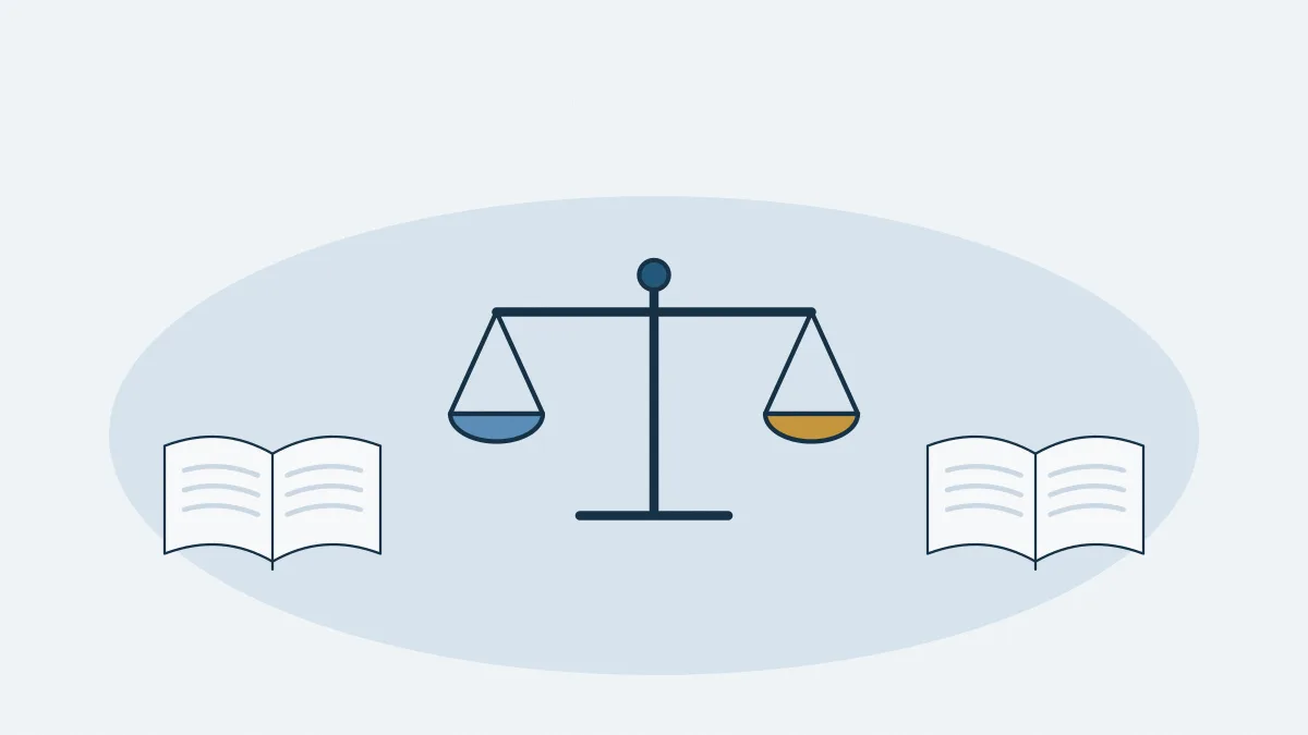 Une balance entre deux livres ouverts