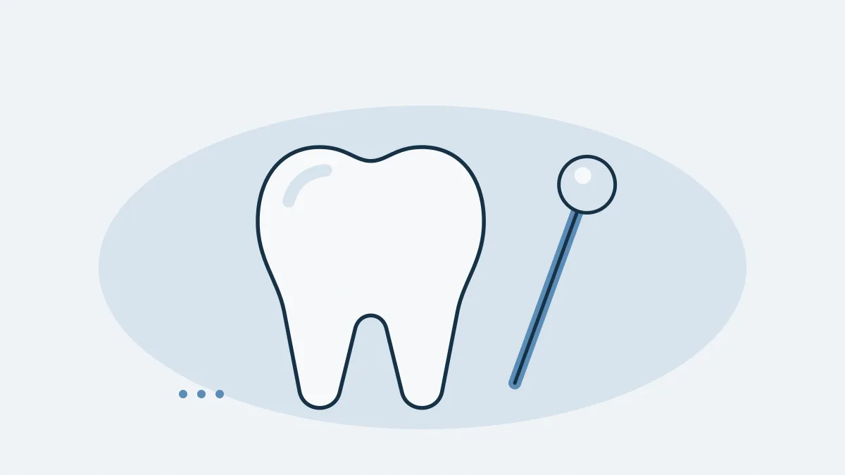 Une dent et un miroir de dentiste
