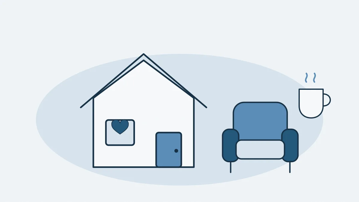 Une maison, un fauteuil et une tasse fumante